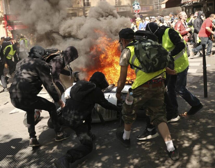 Παρίσι: Άγριες συγκρούσεις αστυνομικών με τα “κίτρινα γιλέκα”
