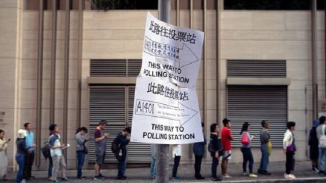 Με φόντο τις διαδηλώσεις και τον εμπορικό πόλεμο οι εκλογές στο Χόνγκ Κόνγκ, Βαγγέλης Σαρακινός