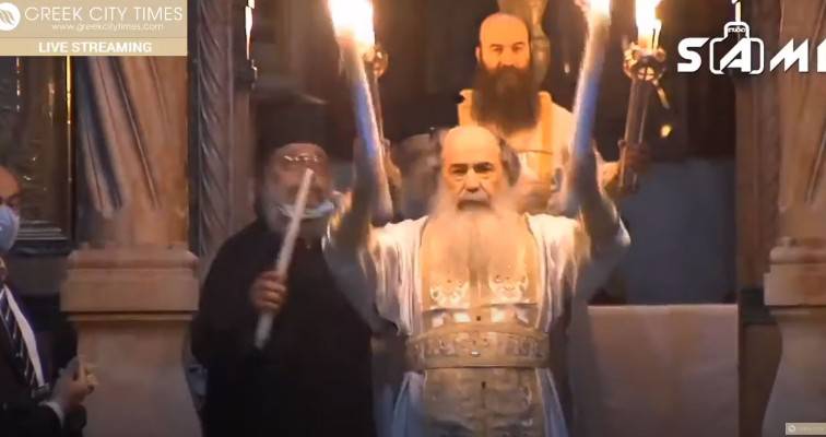 Αναψε το Αγιο Φως στον Πανάγιο Τάφο και ξεκινά το ταξίδι του (βίντεο)