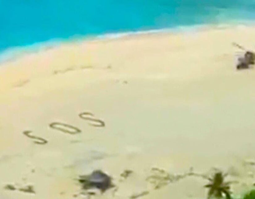Τρεις άνδρες διασώθηκαν από έρημο νησί γράφοντας SOS στην άμμο