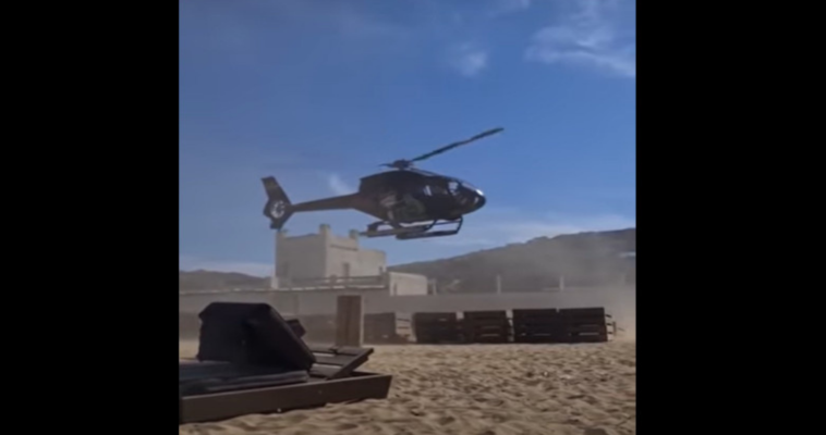 Ελικόπτερο προσγειώνεται δίπλα σε ξαπλώστρες στη Μύκονο