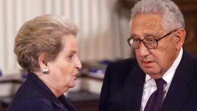 Τα τέσσερα δυτικά κατεστημένα στο παγκόσμιο σύστημα εξουσίας, Νικόλαος Λάος